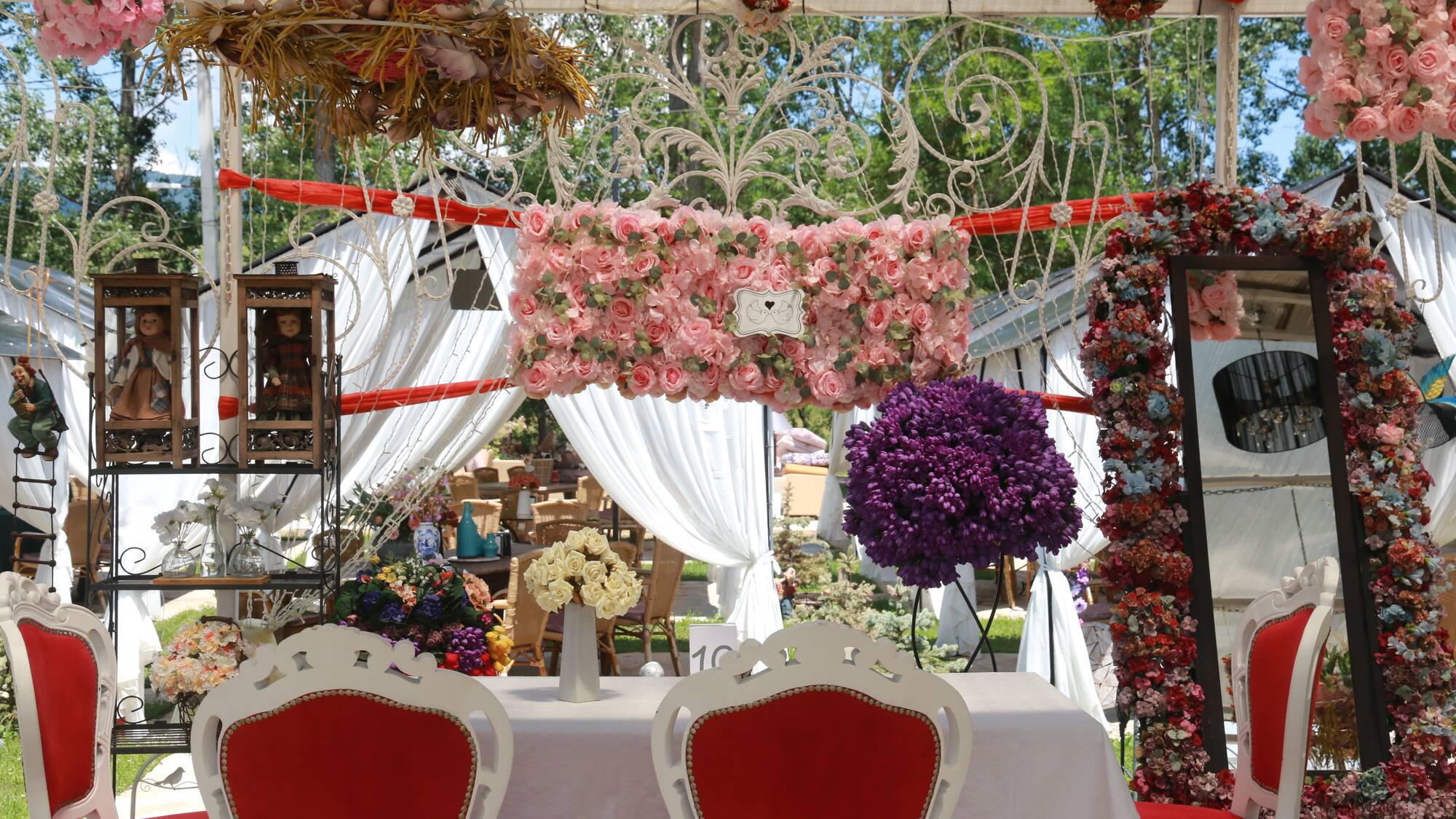 The flowered pergola terrace at Fotine, laid for a celebration